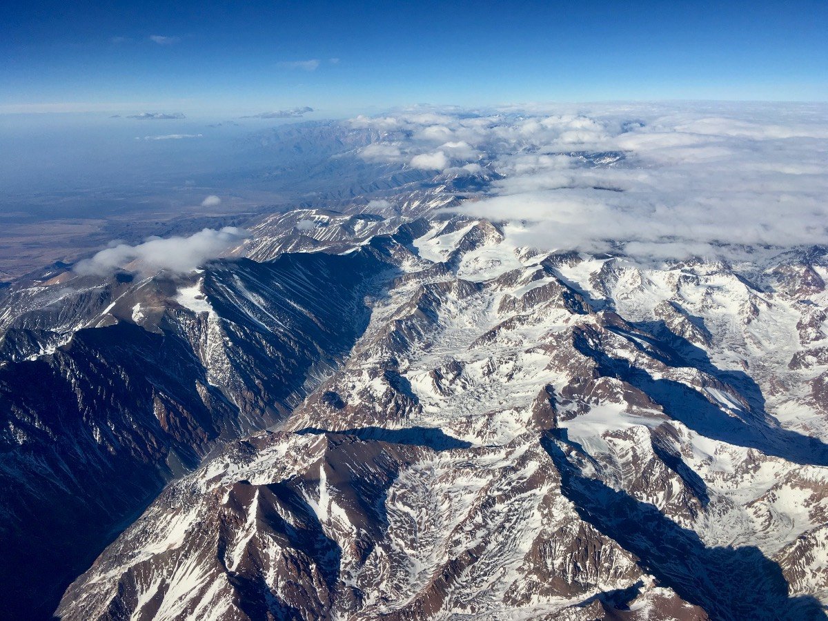 Flying over the Andes mountain range in South America