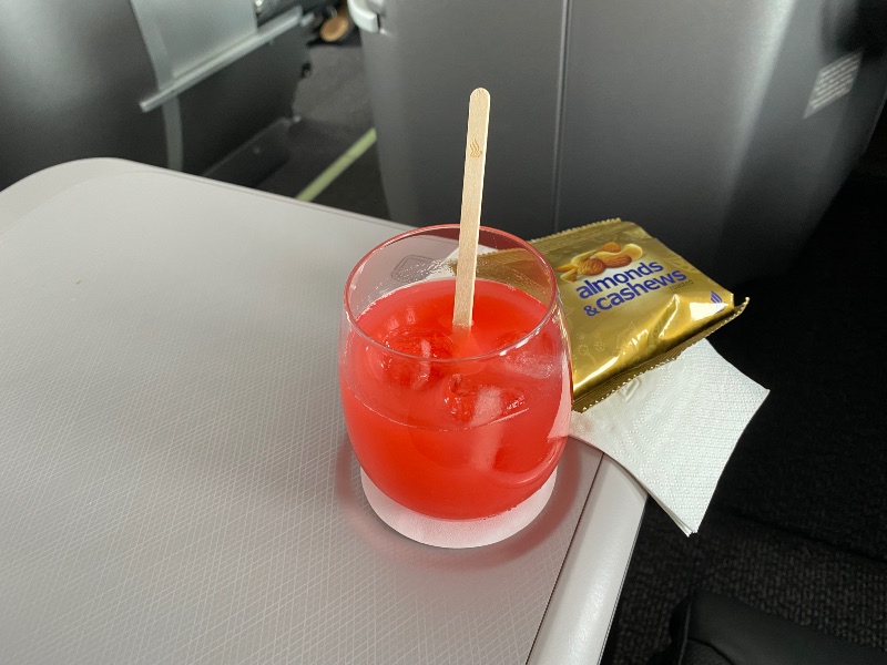 The flight began with a Singapore sling and nuts