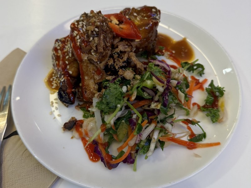 Maple and soy mini drumsticks with Vietnamese slaw in the Qantas SYD domestic business lounge