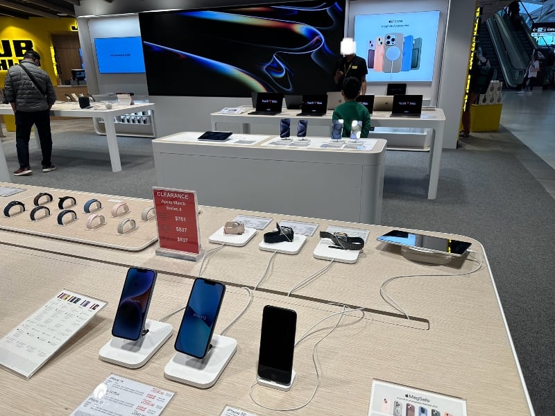 Apple phones and watches for sale at the JB Hi-Fi duty-free store at Sydney Airport Terminal 1