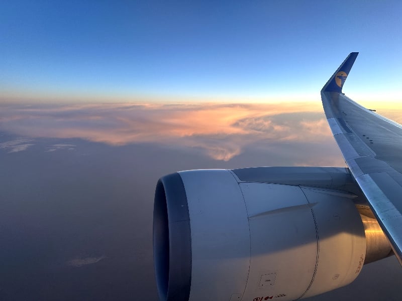 Sunset and a view of the wing from on board a MIAT Mongolian Airlines Boeing 767