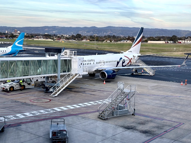 Rex Boeing 737 and a NJE Embraer E190 at Adelaide Airport