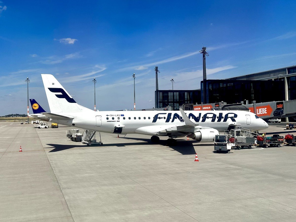 Finnair E190 and a Lufthansa tail at Berlin Brandenburg Airport