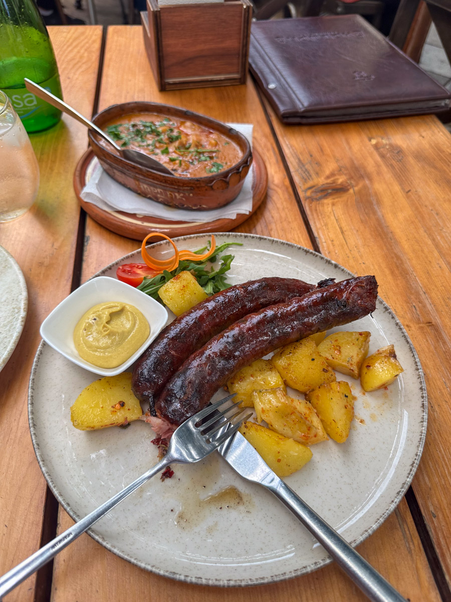 Trying some local Macedonian foods at a restaurant in Skopje