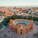 Madrid Plaza de Toros de Las Ventas (Las Ventas Bullring) aerial view with historical buildings in Spain.