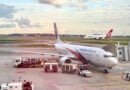 Malaysia Airlines 737-800 and a Qantas A380 at Singapore Changi Airport