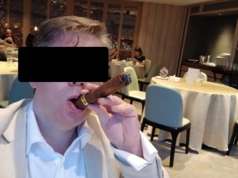 EdibleCigarInMouth.jpeg