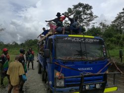 139 - Road to Kokoda. Marjin Sam and Siprian prefer the top and the bullbar had just fallen off.jpg